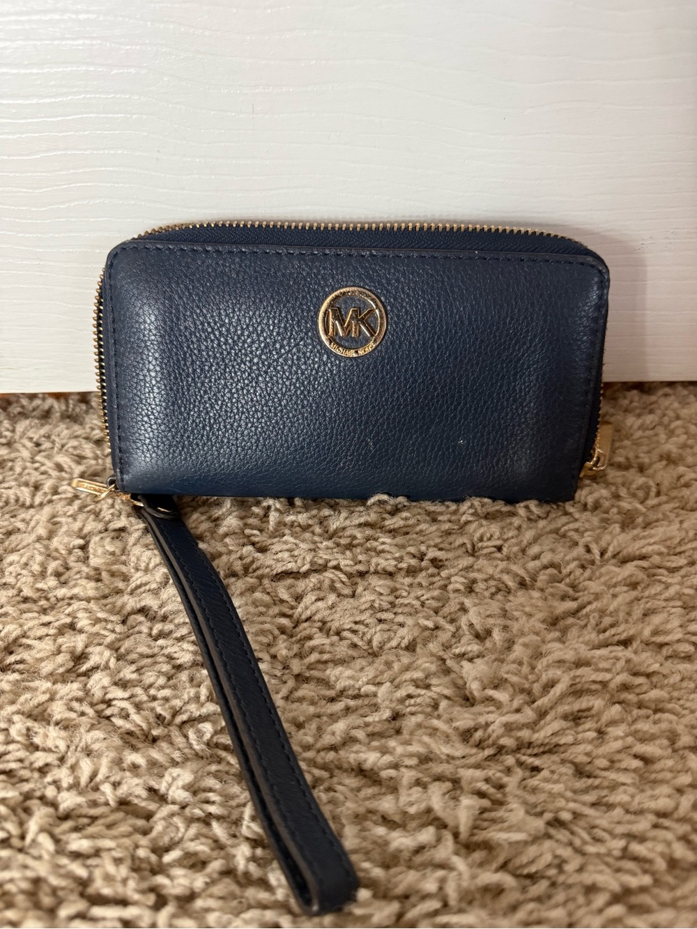 Michael Kors Navy Pebbled Leather Zip Wristlet with Gold MK Emblem